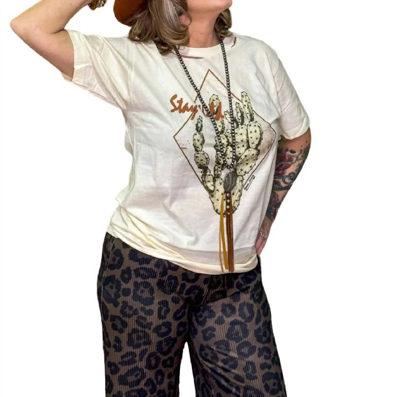 Stay Wild Tee In Ivory Front Pockets Side Pockets Patch Pockets